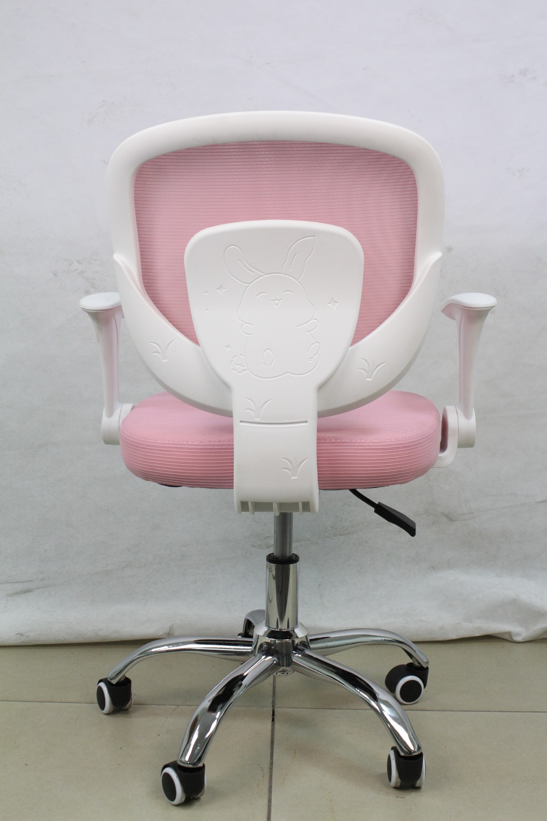 Pink Mesh Study Chair with Flip-Up Arms, back view