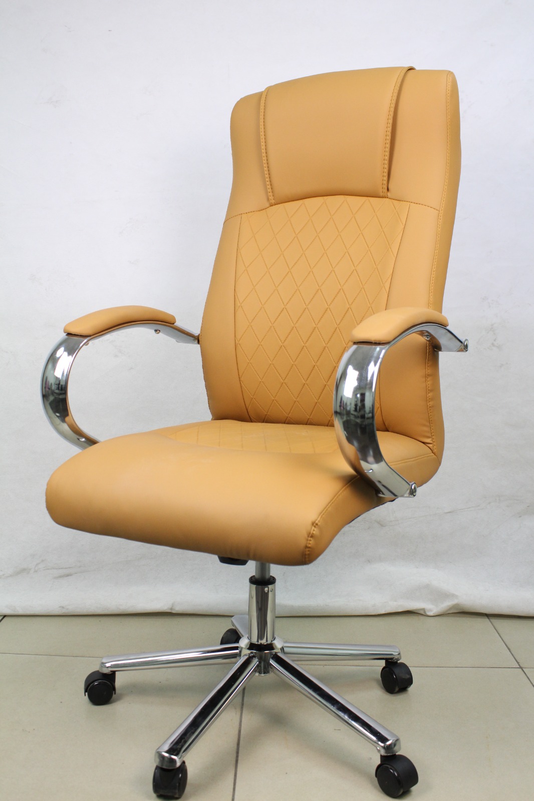 Tan Leather Executive Chair with Diamond Stitching, front angle view