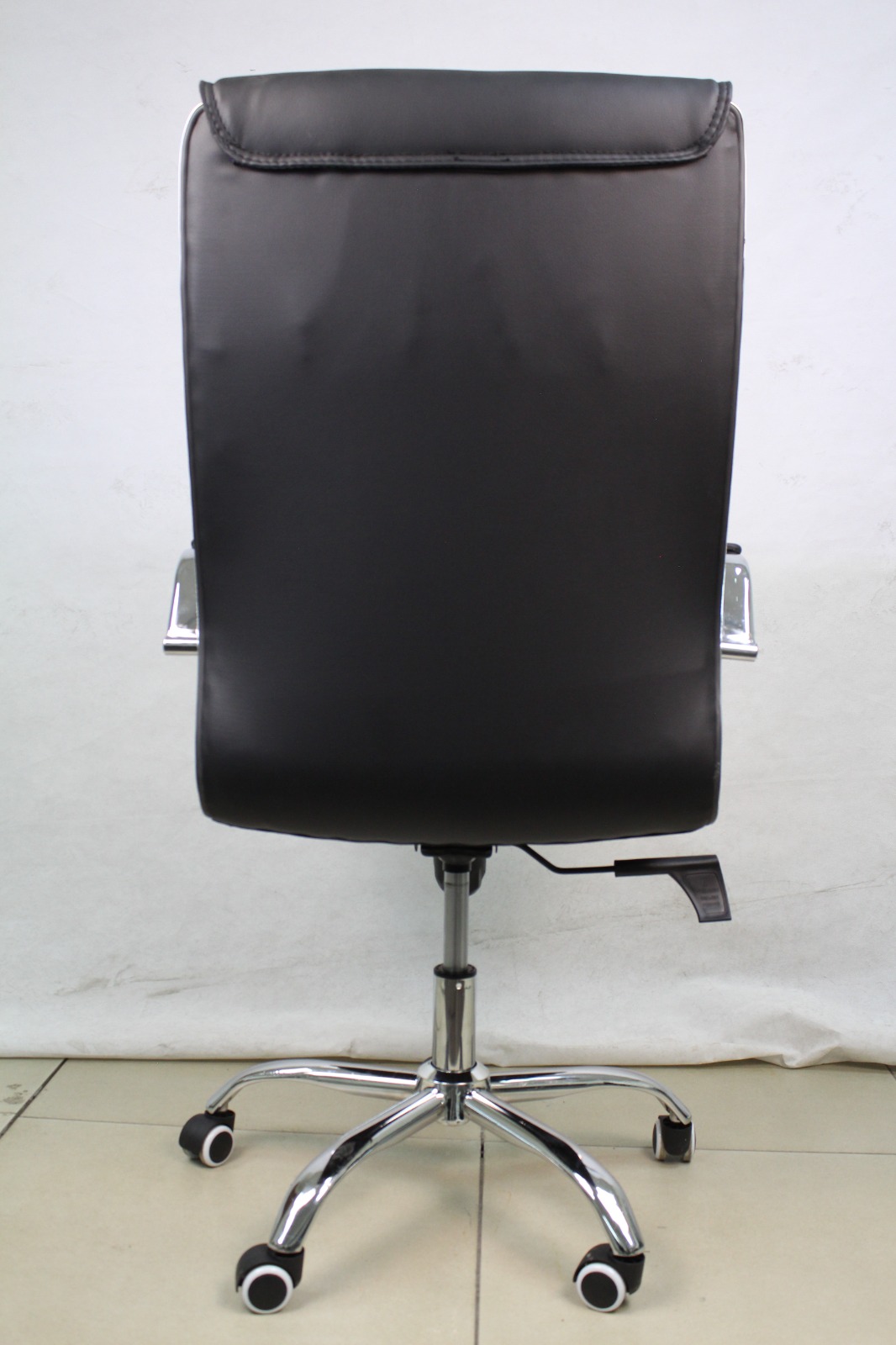 Black Padded Executive Office Chair with Chrome Arms, back view