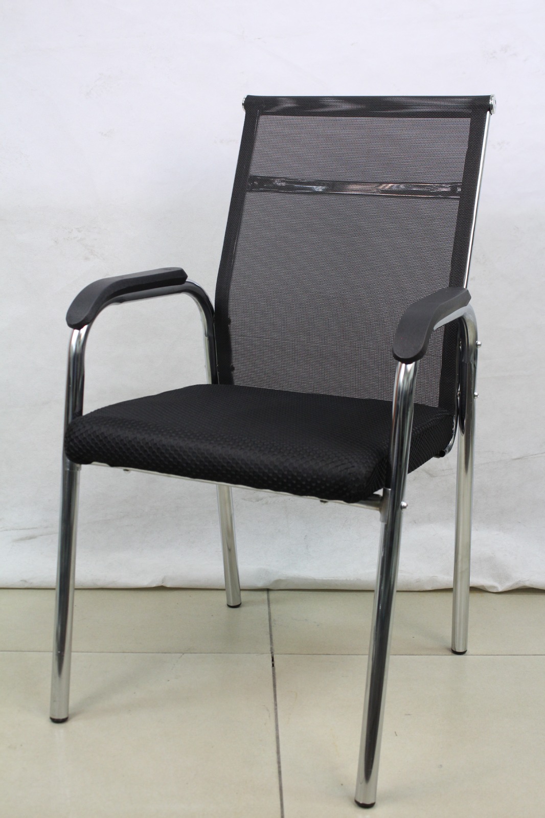 Black Mesh Visitor Chair with Four-Leg Chrome Frame, front angle view