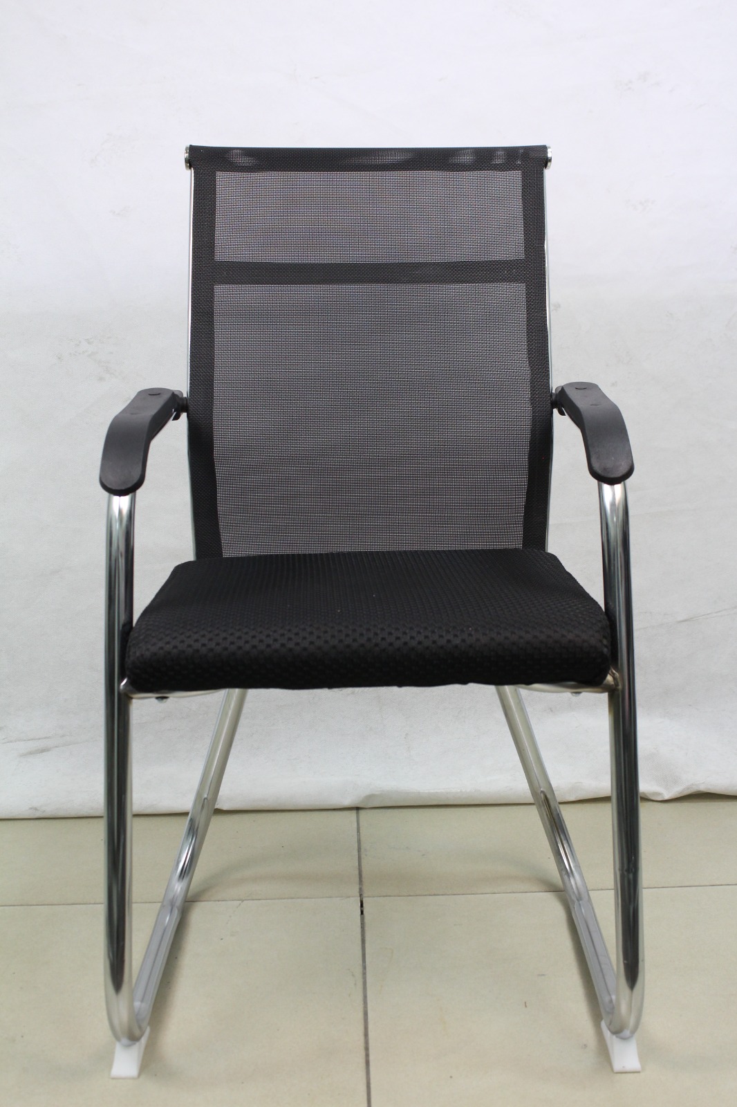 Black Mesh Cantilever Visitor Chair with Chrome Sled Base, front view