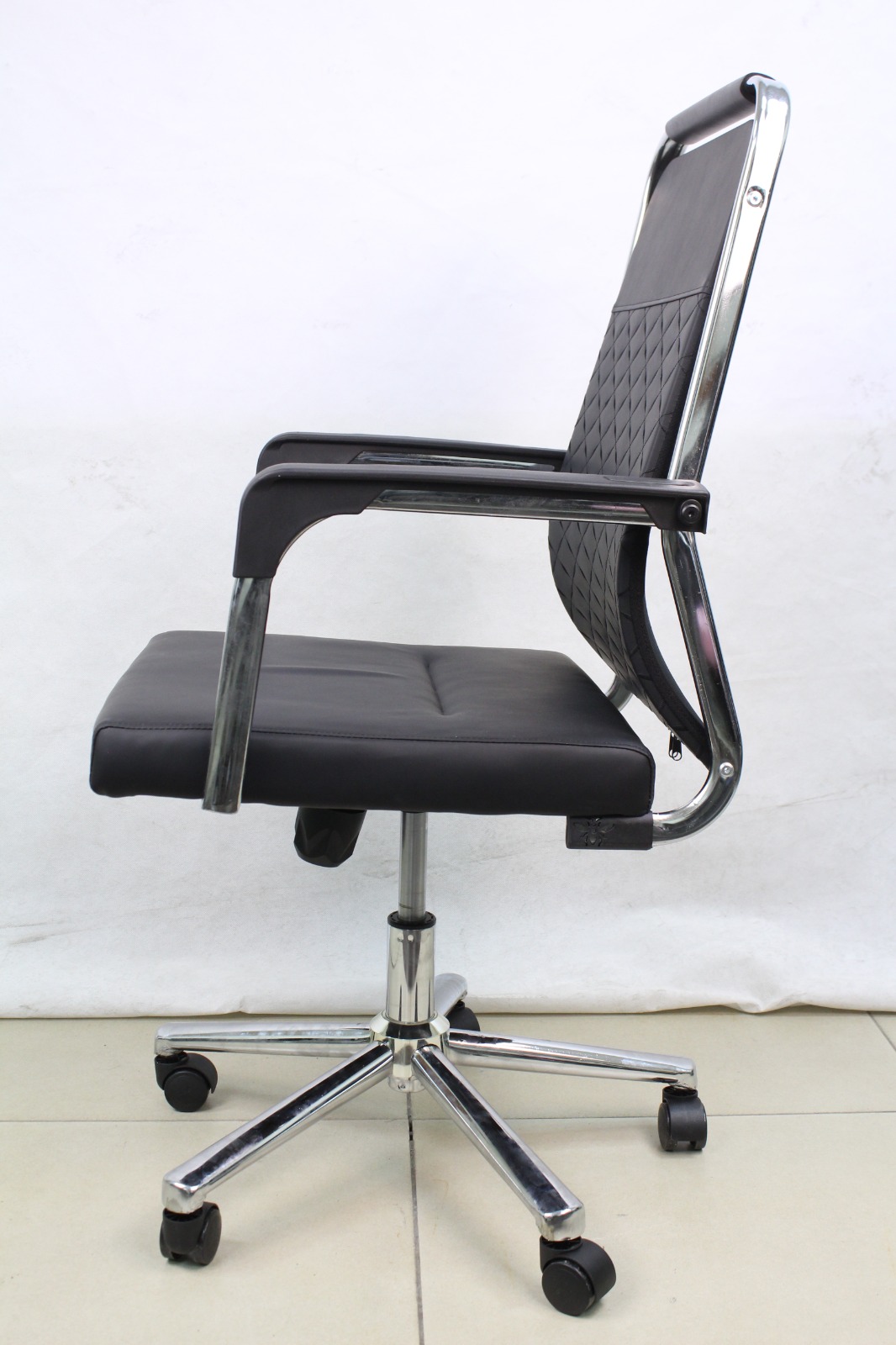 Black Diamond Stitch Leather Mid Back Office Chair, side view