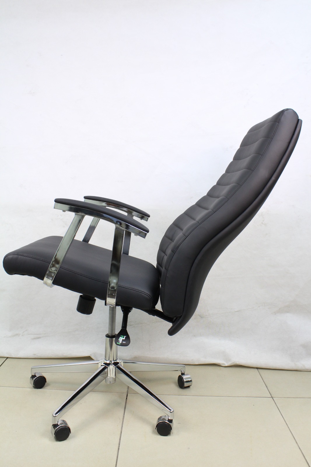 Black Ribbed High Back Leather Executive Chair, side view reclined